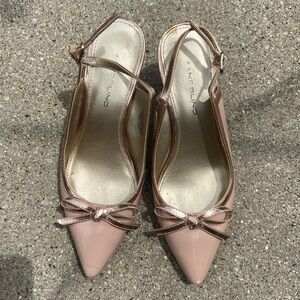 Pink heels with metallic pink bow, size 6
